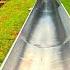 Thrilling Toboggan Ride Fast Alpine Slide Through Beautiful Lush Landscape 2024