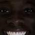 Black Man Smiles In Dark Laughing