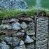 Building Bushcraft Stone Shelter In The Mountain With Grass Roof Cozy Fireplace