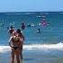 Enjoying Beach Time In Blue Sea White Waves Under Sun Beach Sea Travel Holiday