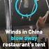 Winds In China Blow Away Restaurant S Tent And Owner