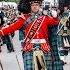 Massed Pipes Drums Parade Through Deeside Town To Start The Ballater Highland Games 2018