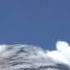 Чили Патагония Вулкан Осорно Облака ползут по верхушке