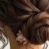 Voluminous Textured Low Bun Wedding Hairstyle