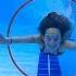 Carla Underwater Playing With A Hula Hoop In A Pool