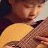 SHE IS JUST 8 YEARS OLD GUITAR PRODIGY Xinyan Paganini 24 Siccas Guitars Shorts