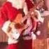 Santa Rocks Out To Feliz Navidad