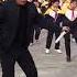 School Principal Shuffles As He Leads Students In Dance Routine