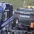 4K Volvo FH16 750 Transporting And Unloading A Volvo EC480E Excavator