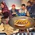 Family Feast In A Cave Cooking Fresh Fish And Bread In An Afghan Village Morning