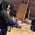 A Rural Family Builds The Roof Of A Rural House And Continues The Routine Of The Pern Family