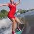 серфинг девушка в платье и на каблуках Surfing A Girl In A Dress And High Heels