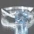 Spiral Shank Engagement Ring With London Blue Topaz And Diamond